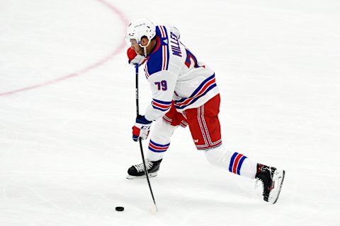 New York Rangers defenseman K’Andre Miller (79) attempts a shot on goal during the first period against the Boston BruinsCredit: Brian Fluharty-USA TODAY Sports