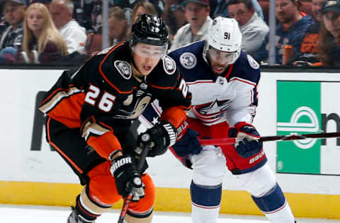 ANAHEIM, CA – NOVEMBER 4: Brandon Montour #26 of the Anaheim Ducks and Anthony Duclair #91 of the Columbus Blue Jackets battle for the puck during the third period of the game at Honda Center on November 4, 2018 in Anaheim, California. (Photo by Debora Robinson/NHLI via Getty Images)