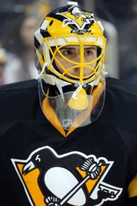 Feb 10, 2016; Pittsburgh, PA, USA; Pittsburgh Penguins goalie Marc-Andre Fleury (29) looks on against the New York Rangers during the third period at the CONSOL Energy Center. The Rangers shutout the Penguins 3-0. Mandatory Credit: Charles LeClaire-USA TODAY Sports