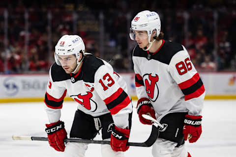 Nico Hischier #13 and Jack Hughes #86 of the New Jersey Devils. (Photo by Scott Taetsch/Getty Images)