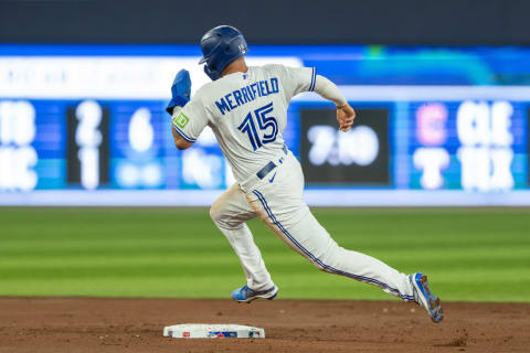 Jul 15, 2023; Toronto, Ontario, CAN; Toronto Blue Jays second baseman Whit Merrifield (15) turns second base during the second inning against the Arizona Diamondbacks at Rogers Centre. Mandatory Credit: Kevin Sousa-USA TODAY Sports