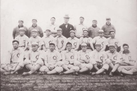 The 1906 Chicago White Sox pose for a team photo. Star pitcher Ed Walsh is seated in the front row, far left, and team owner Charlie Comiskey is standing in street clothes. (Photo by Mark Rucker/Transcendental Graphics, Getty Images)