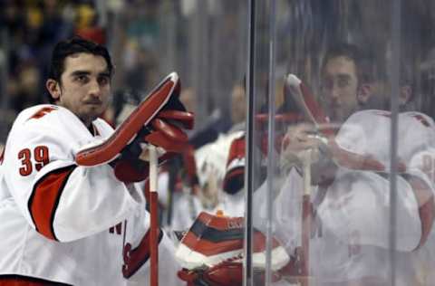 Mar 8, 2020; Pittsburgh, Pennsylvania, USA; Carolina Hurricanes goaltender Alex Nedeljkovic (39) looks on during a time-out against the Pittsburgh Penguins during the second period at PPG PAINTS Arena. Carolina won 6-2. Mandatory Credit: Charles LeClaire-USA TODAY Sports