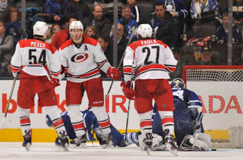 TORONTO, ON – JANUARY 21: Jordan Staal #11 of the Carolina Hurricanes celebrates his overtime game-winning goal with teammates Brett Pesce #54 and Justin Faulk #27 during NHL game action against the Toronto Maple Leafs January 21, 2016 at Air Canada Centre in Toronto, Ontario, Canada. (Photo by Graig Abel/NHLI via Getty Images)