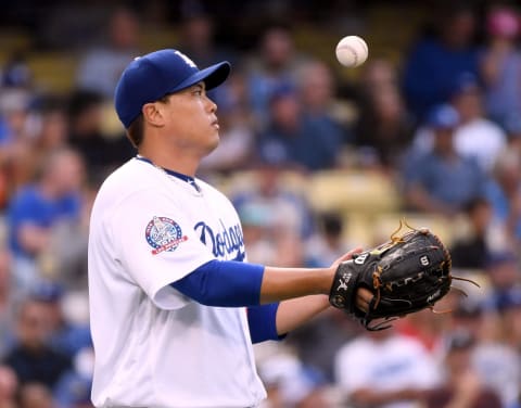 LOS ANGELES, CA – SEPTEMBER 05: Hyun-Jin Ryu #99 of the Los Angeles Dodgers reacts after a single to Brandon Nimmo #9 of the New York Mets to load the bases during the sixth inning at Dodger Stadium on September 5, 2018 in Los Angeles, California. (Photo by Harry How/Getty Images)