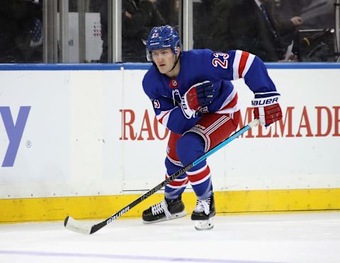 NEW YORK, NEW YORK – OCTOBER 12: Adam Fox #23 of the New York Rangers skates against the Edmonton Oilers at Madison Square Garden on October 12, 2019 in New York City. The Oilers defeated the Rangers 4-1. (Photo by Bruce Bennett/Getty Images)