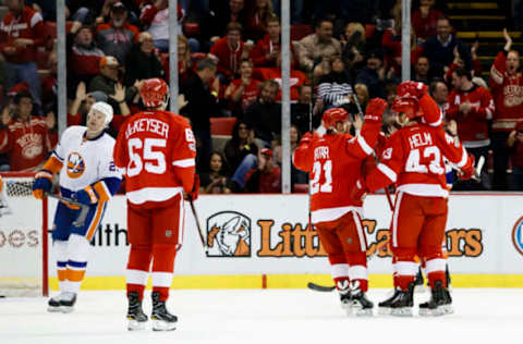 NHL Power Rankings: Detroit Red Wings center Darren Helm (43) receives congratulations from teammates after scoring in the second period against the New York Islanders at Joe Louis Arena. Mandatory Credit: Rick Osentoski-USA TODAY Sports