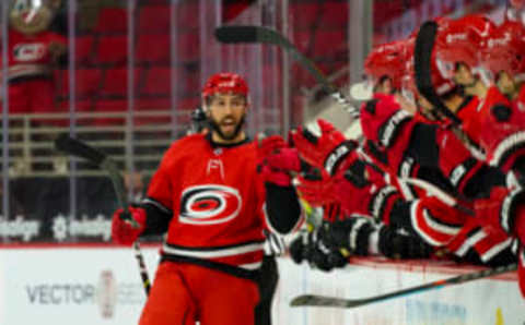 Jan 31, 2021; Raleigh, North Carolina, USA; Carolina Hurricanes center Vincent Trocheck (16) scores the game winning shootout goal against Dallas Stars at PNC Arena. Mandatory Credit: James Guillory-USA TODAY Sports