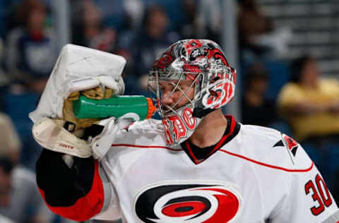 TAMPA, FL – OCTOBER 10: Goaltender Cam Ward #30 of the Carolina Hurricanes gets a drink during a break in the action against the Tampa Bay Lightning at the St. Pete Times Forum on October 10, 2009 in Tampa, Florida. (Photo by Scott Audette/NHLI via Getty Images)