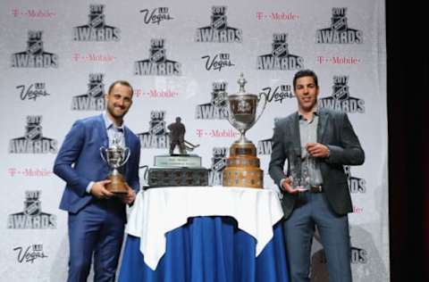 LAS VEGAS, NV – JUNE 20: Nick Foligno of the Columbus Blue Jackets (L) poses with the King Clancy Memorial Trophy and the Mark Messier Leadership Award as Travis Hamonic of the New York Islanders (R) poses with the NHL Foundation Player Award during the 2017 NHL Humanitarian Awards at Encore Las Vegas on June 20, 2017 in Las Vegas, Nevada. (Photo by Bruce Bennett/Getty Images)