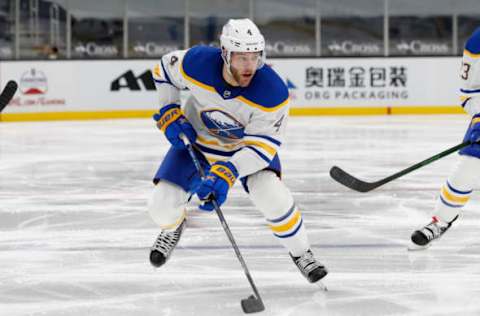 Mar 27, 2021; Boston, Massachusetts, USA; Buffalo Sabres left wing Taylor Hall (4) during the first period against the Boston Bruins at TD Garden. Mandatory Credit: Winslow Townson-USA TODAY Sports