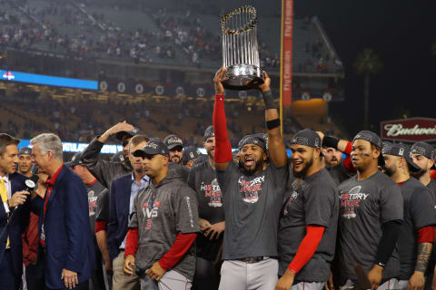 LOS ANGELES, CA – OCTOBER 28: Eduardo Nunez #36 of the Boston Red Sox holds up the World Series trophy as the Red Sox celebrate defeating the Los Angeles Dodgers in Game 5 of the 2018 World Series between the Boston Red Sox and the Los Angeles Dodgers at Dodger Stadium on Sunday, October 28, 2018 in Los Angeles, California. (Photo by Alex Trautwig/MLB Photos via Getty Images)