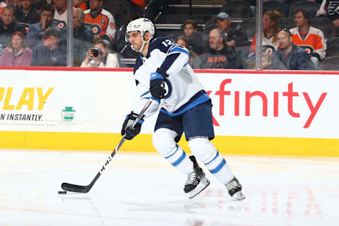 PHILADELPHIA, PA – FEBRUARY 22: Dylan DeMelo #12 of the Winnipeg Jets.. (Photo by Mitchell Leff/Getty Images)