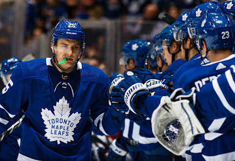 TORONTO, ON – FEBRUARY 20: James van Riemsdyk #25 of the Toronto Maple Leafs is congratulated by his teammates after he scored on the Florida Panthers during the first period at the Air Canada Centre on February 20, 2018 in Toronto, Ontario, Canada. (Photo by Kevin Sousa/NHLI via Getty Images)