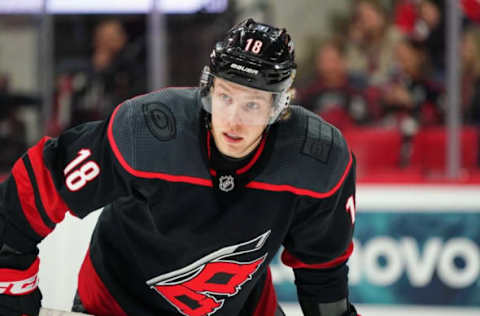 Dec 31, 2019; Raleigh, North Carolina, USA; Carolina Hurricanes center Ryan Dzingel (18) at PNC Arena. The Carolina Hurricanes defeated the Montreal Canadiens 3-1. Mandatory Credit: James Guillory-USA TODAY Sports