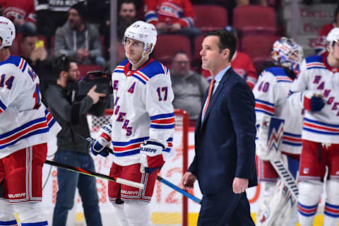 : Head coach of the New York Rangers David Quinn walks across the rink after a victory against the Montreal Canadiens at the Bell Centre on February 27, 2020 in Montreal, Canada. The New York Rangers (Photo by Minas Panagiotakis/Getty Images)