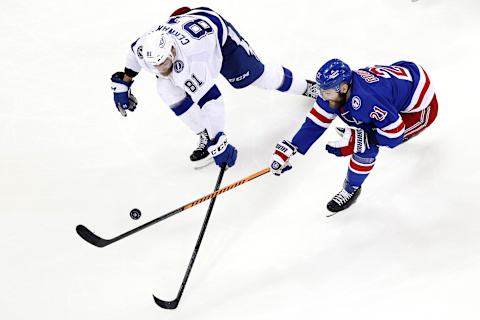 NEW YORK, NEW YORK – JUNE 01: Barclay Goodrow #21 of the New York Rangers fights for the puck against Erik Cernak #81 of the Tampa Bay Lightning d3in Game One of the Eastern Conference Final of the 2022 Stanley Cup Playoffs at Madison Square Garden on June 01, 2022 in New York City. (Photo by Sarah Stier/Getty Images)