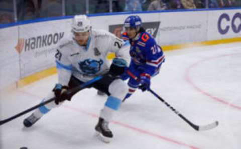 SAINT PETERSBURG, RUSSIA – 2022/03/04: SKA Hockey Club player, Marat Khusnutdinov (R) and Dinamo Hockey Club player, Malte Stromwall (L) in action during the Kontinental Hockey League, Gagarin Cup, KHL 2021/22 between SKA Saint Petersburg and Dinamo Minsk at the Ice Sports Palace.(Final score; SKA Saint Petersburg 3:1 Dinamo Minsk). (Photo by Maksim Konstantinov/SOPA Images/LightRocket via Getty Images)