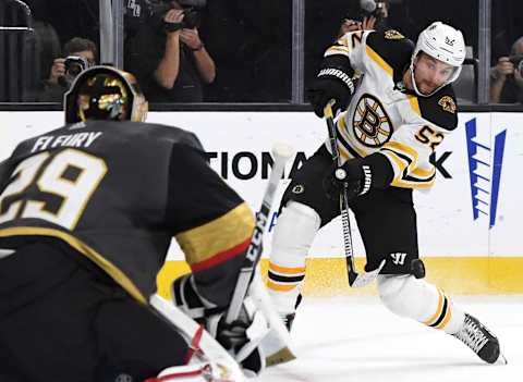 LAS VEGAS, NEVADA – OCTOBER 08: Sean Kuraly #52 of the Boston Bruins takes a shot against Marc-Andre Fleury #29 of the Vegas Golden Knights in the first period of their game at T-Mobile Arena on October 8, 2019 in Las Vegas, Nevada. The Bruins defeated the Golden Knights 4-3. (Photo by Ethan Miller/Getty Images)