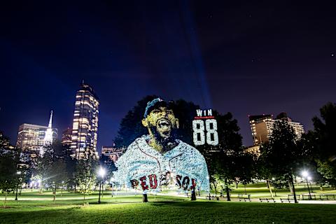 BOSTON, MA – SEPTEMBER 30: An image of David Pricce #24 of the Boston Red Sox is projected onto trees on Boston Common on September 30, 2018 in Boston, Massachusetts. (Photo by Billie Weiss/Boston Red Sox/Getty Images)