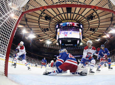 NEW YORK, NEW YORK – DECEMBER 06: Nate Thompson #44 of the Montreal Canadiens (L) scores the game winning goal at 18:53 of the third period against the New York Rangers at Madison Square Garden on December 06, 2019 in New York City. The Canadiens defeated the Rangers 2-1. (Photo by Bruce Bennett/Getty Images)