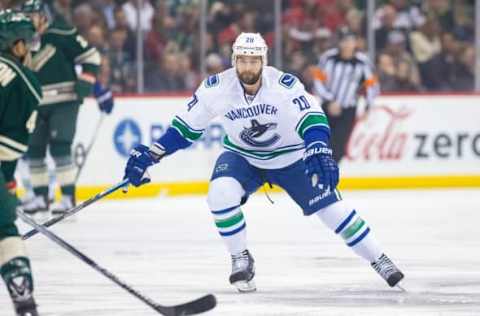 Nov 25, 2015; Saint Paul, MN, USA; Vancouver Canucks forward Chris Higgins (20) skates after the puck in the first period against the Minnesota Wild at Xcel Energy Center. Mandatory Credit: Brad Rempel-USA TODAY Sports