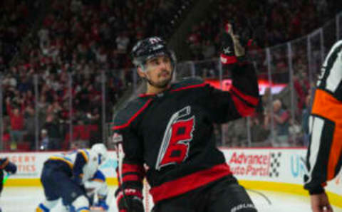 Feb 21, 2023; Raleigh, North Carolina, USA; Carolina Hurricanes center Seth Jarvis (24) celebrates his goal against the St. Louis Blues during the third period at PNC Arena. Mandatory Credit: James Guillory-USA TODAY Sports