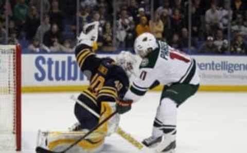 Mar 5, 2016; Buffalo, NY, USA; Buffalo Sabres goalie Robin Lehner (40) stops Minnesota Wild left wing Zach Parise (11) in a shootout at First Niagara Center. Minnesota beats Buffalo 3 to 2. Mandatory Credit: Timothy T. Ludwig-USA TODAY Sports