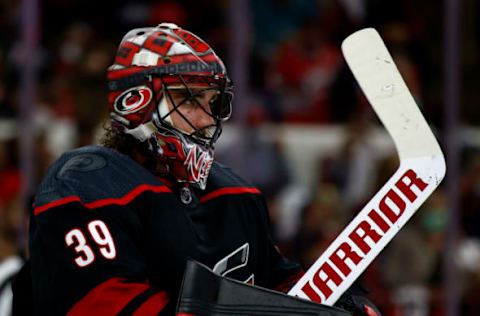 RALEIGH, NORTH CAROLINA – MAY 19: Alex Nedeljkovic #39 of the Carolina Hurricanes looks on during the second period in Game Two of the First Round of the 2021 Stanley Cup Playoffs against the Nashville Predators at PNC Arena on May 19, 2021, in Raleigh, North Carolina. (Photo by Jared C. Tilton/Getty Images)