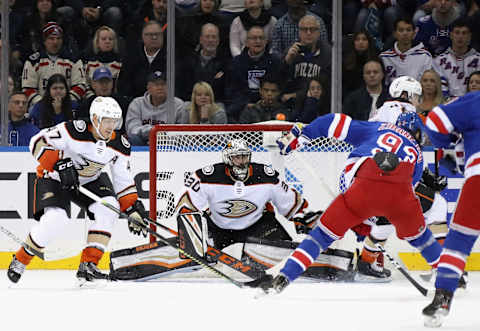 NEW YORK, NEW YORK – DECEMBER 22: Ryan Miller #30 of the Anaheim Ducks braces for a first period shot from Mika Zibanejad #93 of the New York Rangers at Madison Square Garden on December 22, 2019 in New York City. (Photo by Bruce Bennett/Getty Images)