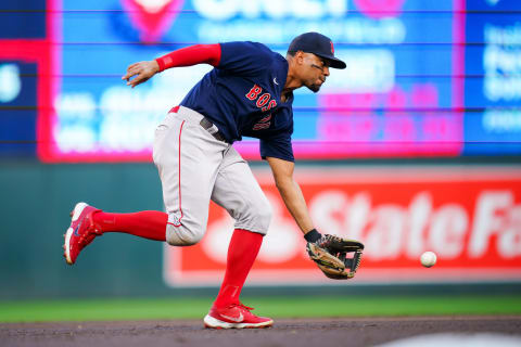 Aug 29, 2022; Minneapolis, Minnesota, USA; Boston Red Sox shortstop Xander Bogaerts (2) fields a ground ball against the Minnesota Twins in the second inning at Target Field. Mandatory Credit: Brad Rempel-USA TODAY Sports