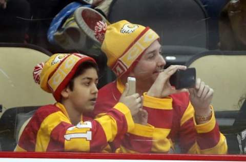 Mar 5, 2016; Pittsburgh, PA, USA; Calgary Flames fans take photos during the game against the Pittsburgh Penguins in the third period at the CONSOL Energy Center. The Flames won 4-2. Mandatory Credit: Charles LeClaire-USA TODAY Sports