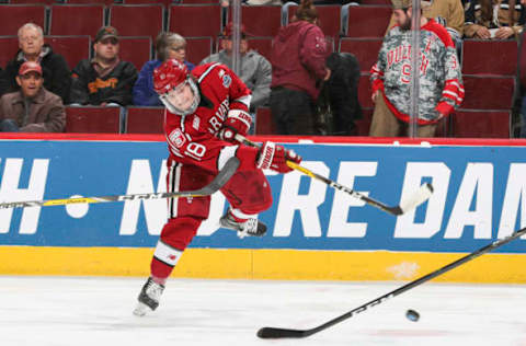 CHICAGO, IL – APRIL 06: Adam Fox #18 of the Harvard Crimson takes a shot during the Division I Men’s Ice Hockey Semifinals held at the United Center on April 6, 2017 in Chicago, Illinois. (Photo by Chase Agnello-Dean/NCAA Photos via Getty Images)