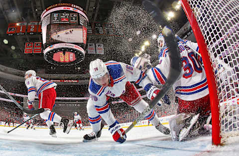 PHILADELPHIA, PA – NOVEMBER 23: Henrik Lundqvist #30, Brady Skjei #76 and Chris Kreider #20 of the New York Rangers battle to defend their open net against the Philadelphia Flyers on November 23, 2018 at the Wells Fargo Center in Philadelphia, Pennsylvania. (Photo by Len Redkoles/NHLI via Getty Images)