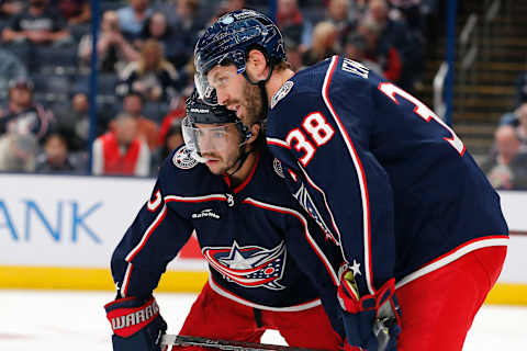 Oct 25, 2022; Columbus, Ohio, USA; Columbus Blue Jackets left wing Johnny Gaudreau (13) and center Boone Jenner (38) during the first period against the Arizona Coyotes at Nationwide Arena. Mandatory Credit: Russell LaBounty-USA TODAY Sports