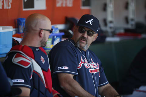 SAN FRANCISCO, CA – MAY 23: Tyler Flowers #25 and Catching Coach Sal Fasano #60 of the Atlanta Braves talk in the dugout during the game against the San Francisco Giants at Oracle Park on July 23, 2019 in San Francisco, California. The Braves defeated the Giants 5-3. (Photo by Michael Zagaris/Getty Images)