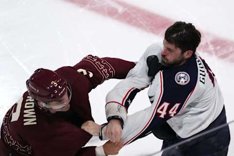 Feb 19, 2023; Tempe, Arizona, USA; Arizona Coyotes defenseman Josh Brown (3) and Columbus Blue Jackets defenseman Erik Gudbranson (44) fight during the second period at Mullett Arena. Mandatory Credit: Joe Camporeale-USA TODAY Sports