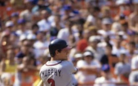 FLUSHING, NY – 1987: Outfielder Dale Murphy #3 of the Atlanta Braves follows through after swinging at a pitch during a game in 1987 against the New York Mets at Shea Stadium in Flushing, New York. (Photo by: Diamond Images/Getty Images)