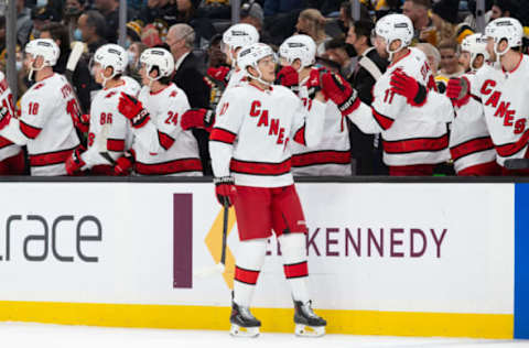 BOSTON, MA – JANUARY 18: Jesperi Kotkaniemi #82 of the Carolina Hurricanes celebrates his goal against the Boston Bruins with his teammates during the first period at the TD Garden on January 18, 2022, in Boston, Massachusetts. The Hurricanes won 7-1. (Photo by Richard T Gagnon/Getty Images)