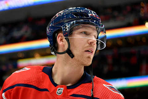 WASHINGTON, DC – JANUARY 07: Capitals center Lars Eller (20) looks at fans signs during warm ups before the Ottawa Senators vs. Washington Capitals NHL game on January 7, 2020 at Capital One Arena in Washington, D.C.. (Photo by Randy Litzinger/Icon Sportswire via Getty Images)