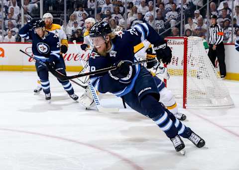 WINNIPEG, MB – MAY 1: Patrik Laine #29 of the Winnipeg Jets follows the play up the ice during first period action against the Nashville Predators in Game Three of the Western Conference Second Round during the 2018 NHL Stanley Cup Playoffs at the Bell MTS Place on May 1, 2018 in Winnipeg, Manitoba, Canada. The Jets defeated the Preds 7-4 and lead the series 2-1. (Photo by Jonathan Kozub/NHLI via Getty Images)