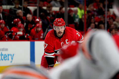 RALEIGH, NC – MARCH 20: Justin Faulk #27 of the Carolina Hurricanes prepares for a faceoff during an NHL game against the Edmonton Oilers on March 20, 2018 at PNC Arena in Raleigh, North Carolina. (Photo by Gregg Forwerck/NHLI via Getty Images)