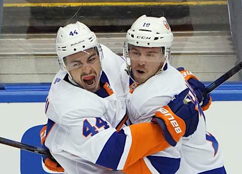 TORONTO, ONTARIO – AUGUST 05: Jean-Gabriel Pageau #44 of the New York Islanders (L) celebrates his goal at 16:26 of the first period against the Florida Panthers and is joined by Anthony Beauvillier #18 (R) in Game Three of the Eastern Conference Qualification Round prior to the 2020 NHL Stanley Cup Playoffs at Scotiabank Arena on August 5, 2020 in Toronto, Ontario, Canada. (Photo by Andre Ringuette/Freestyle Photo/Getty Images)