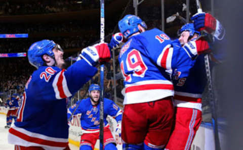 Derek Stepan #21 of the New York Rangers celebrates with Chris Kreider #20, Jesper Fast #19. (Photo by Bruce Bennett/Getty Images)