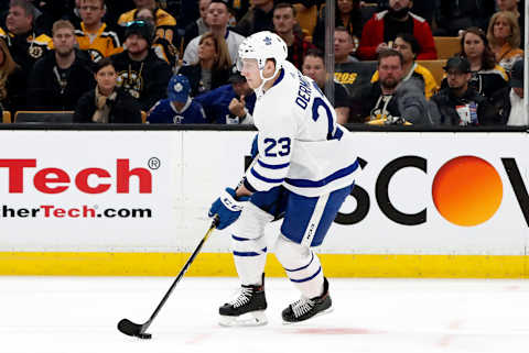 BOSTON, MA – APRIL 11: Toronto Maple Leafs defenseman Travis Dermott (23) skates the puck up ice during Game 1 of the First Round between the Boston Bruins and the Toronto Maple Leafs on April 11, 2019, at TD Garden in Boston, Massachusetts. (Photo by Fred Kfoury III/Icon Sportswire via Getty Images)