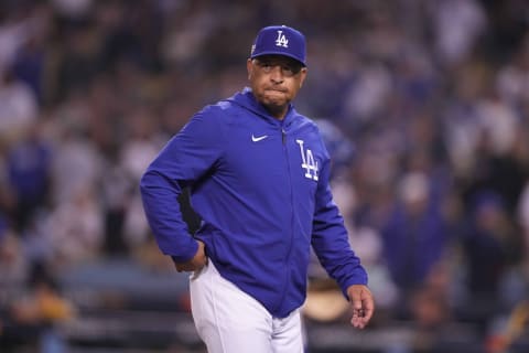 Oct 11, 2022; Los Angeles, California, USA; Los Angeles Dodgers manager Dave Roberts (30) reacts during game one of the NLDS for the 2022 MLB Playoffs against the San Diego Padres at Dodger Stadium. The Dodgers defeated the Padres 5-3. Mandatory Credit: Kirby Lee-USA TODAY Sports