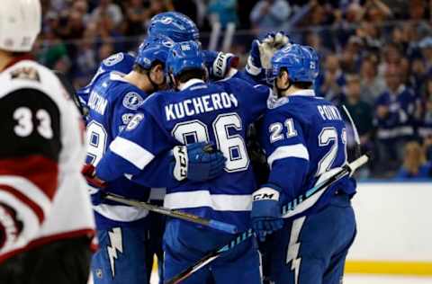 Mar 21, 2017; Tampa, FL, USA; Tampa Bay Lightning right wing Nikita Kucherov (86) is congratulated by teammates after he scored against the Arizona Coyotes during the second period at Amalie Arena. Mandatory Credit: Kim Klement-USA TODAY Sports