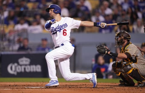 Oct 11, 2022; Los Angeles, California, USA; Los Angeles Dodgers shortstop Trea Turner (6) doubles in the third inning of game one of the NLDS for the 2022 MLB Playoffs against the San Diego Padres at Dodger Stadium. Mandatory Credit: Kirby Lee-USA TODAY Sports