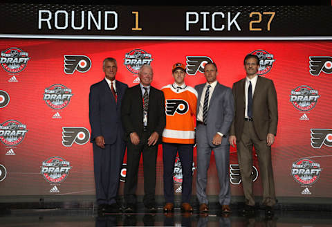 CHICAGO, IL – JUNE 23: (L-R) President Paul Holmgren, SVP Bobby Clarke, Nolan Patrick, second overall pick of the Philadelphia Flyers, executive VP Ron Hextall and assistant GM and director of player personnel Chris Pryor pose for a group photo onstage during Round One of the 2017 NHL Draft at United Center on June 23, 2017 in Chicago, Illinois. (Photo by Dave Sandford/NHLI via Getty Images)