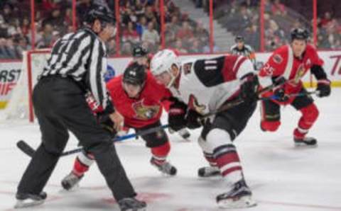 Oct 18, 2016; Ottawa, Ontario, CAN; Ottawa Senators center Jean-Gabriel Pageau (44) faces off against Arizona Coyotes center Martin Hanzal (11) in the second period at the Canadian Tire Centre. Mandatory Credit: Marc DesRosiers-USA TODAY Sports